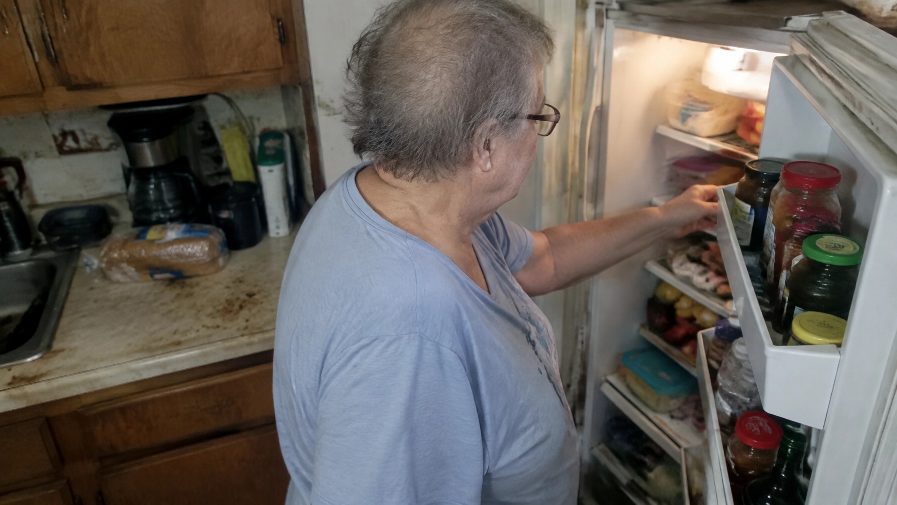 Couple preparing a simple meal in a warm home kitchen